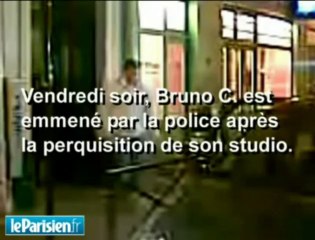 Bruno C. est emmené par la police après la perquisition de son appartement