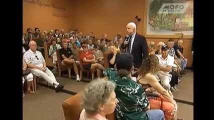 (Vídeo) Guy calls for John McCain to be  arrested and tried for treason  at town hall meeting