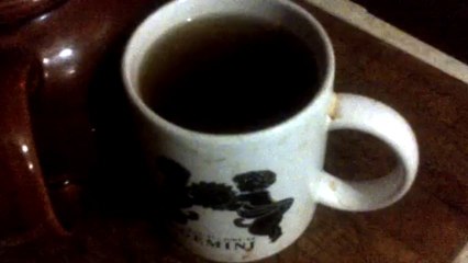 After waiting 45 minutes for it to brew, the sweet basil tea is ready to be poured and this is my reaction to it all