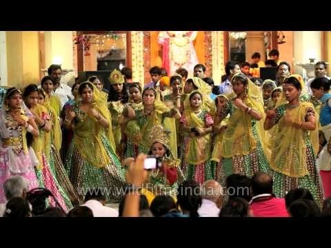 Children dressed up as Lord Krishna dance on the occasion of Janmashtami in Delhi