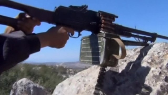 Syrian rebels clash with pro-Assad forces over strategic town in Idlib province