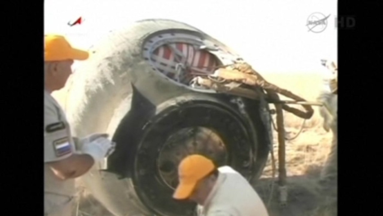 Three space station crewmembers land after 166-day mission.