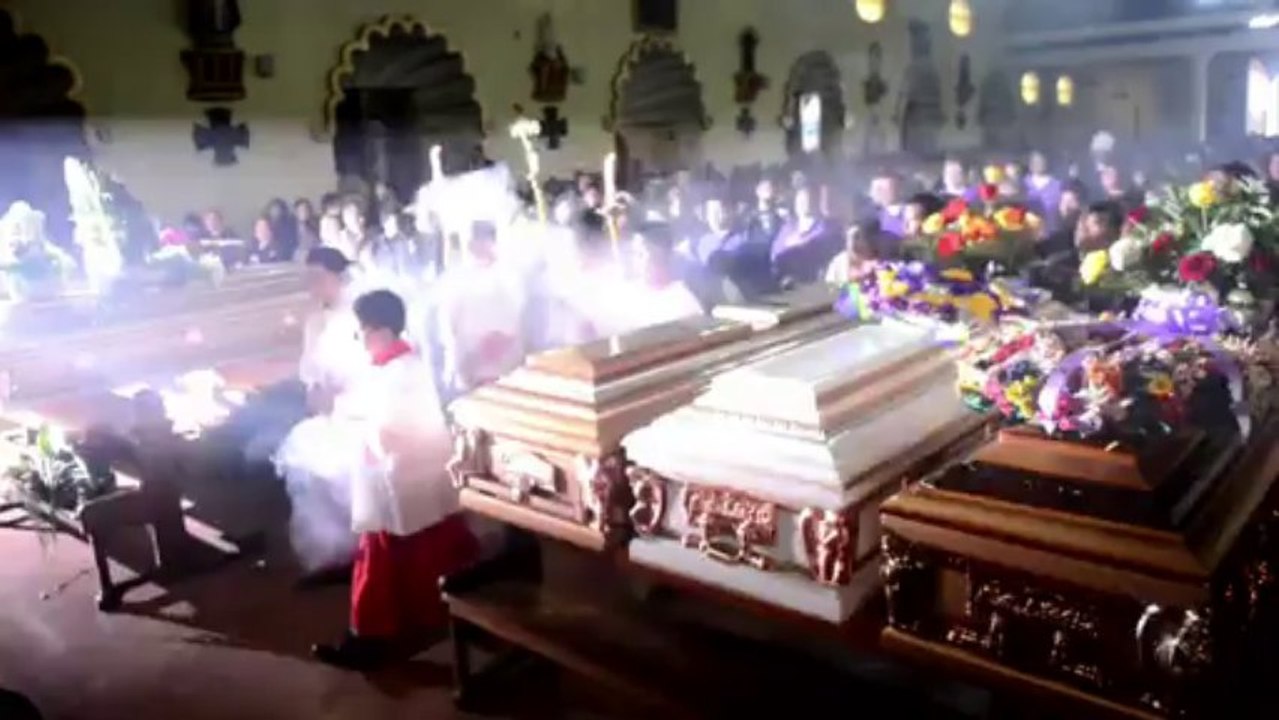 Guatemalans hold funeral for 44 bus victims