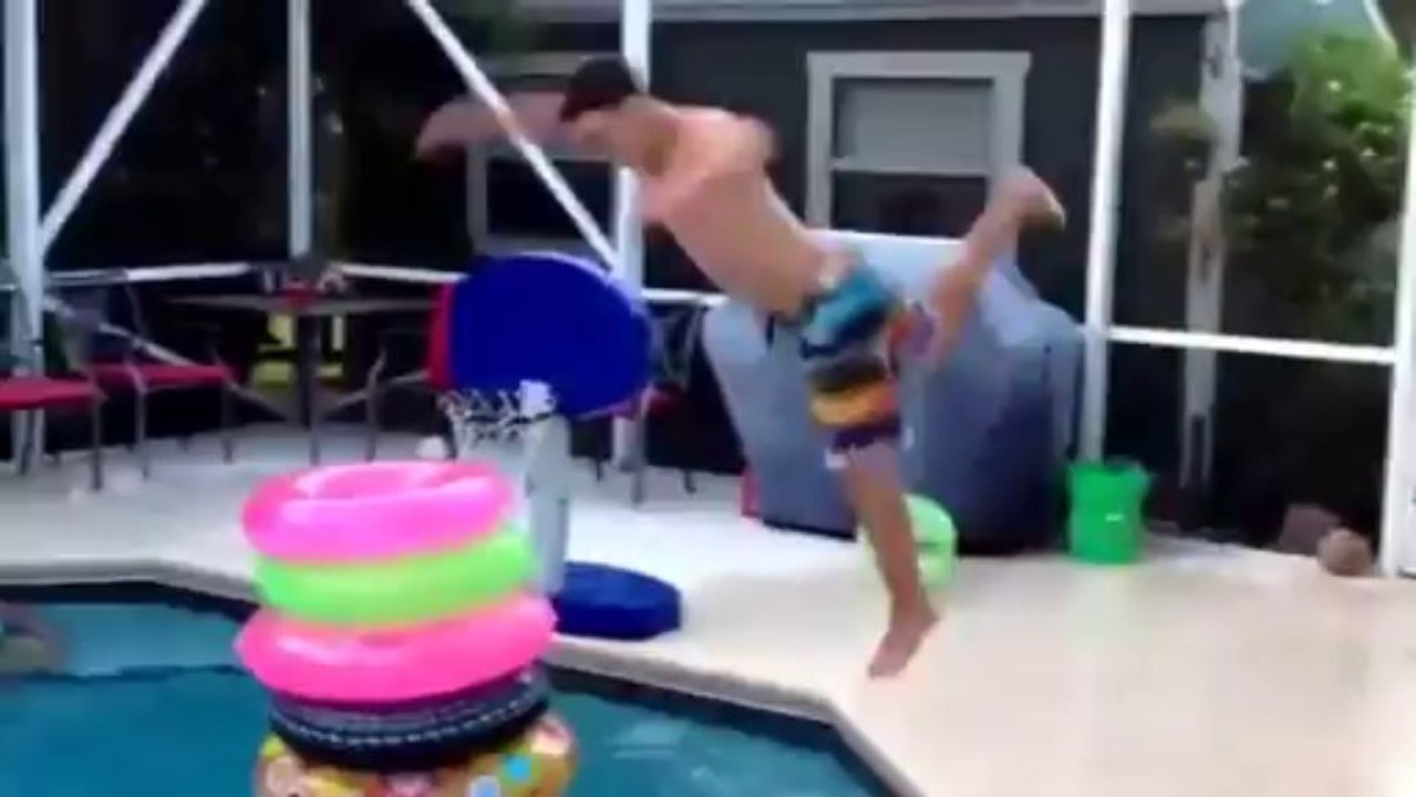 Man Becomes One with Stack of Tubes