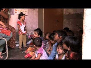 Kids of the potter reciting rhymes at Angandwadi school