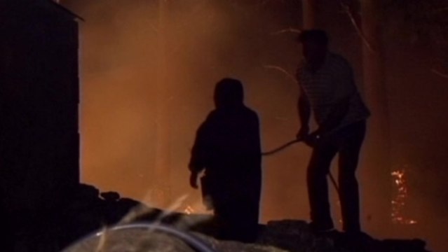 Massive fires threaten villages in north-western Spain