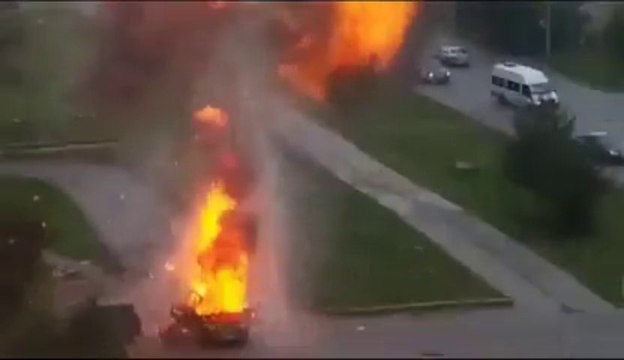 Amazing and violent : a car explosion in the middle of the street.