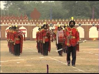Group of army unit matching their feet together with the sounds of music