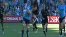 Rugby player gets wrecked by huge stiff arm