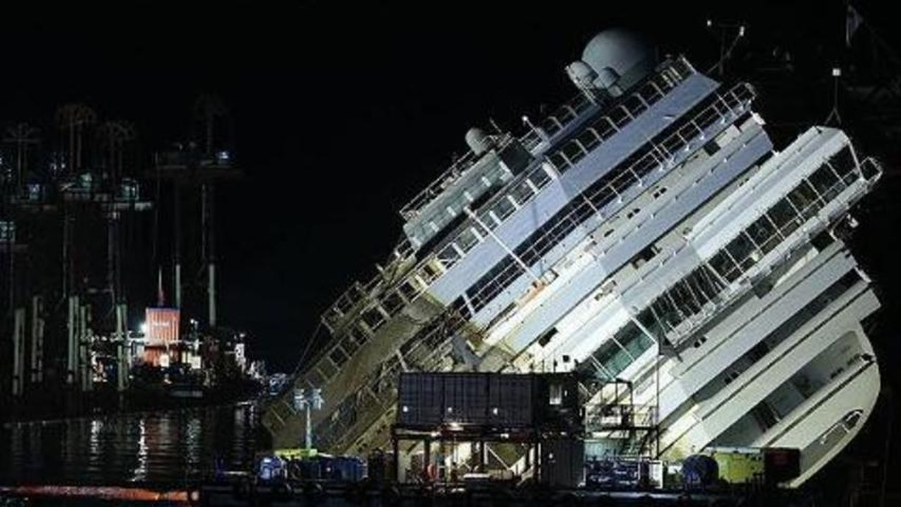 Costa Concordia pulled off Italian reef