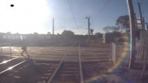 Narrow escape for a pedestrian crossing train tracks