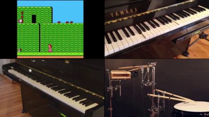 Скачать видео: Le thème musical de Super Mario Bros. joué par des robots au piano/batterie en temps réel sur le Jeu Vidéo!