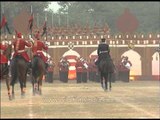 Army personnel riding a horse performs a musical contingent during BSF Tattoo Show
