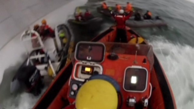 Greenpeace video shows activists held at gunpoint