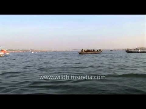 Devotees take boat ride in Sangam during Ardh Kumbh Kumbh