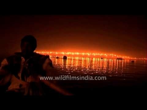 Devotees take a holy boat ride during Ardh Kumbh Mela