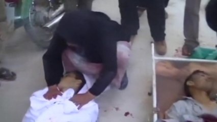 GRAPHIC IMAGES Assad forces kill 15 in Sunni village - activists