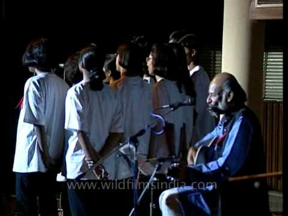 Susmit Bose performs with choir of children