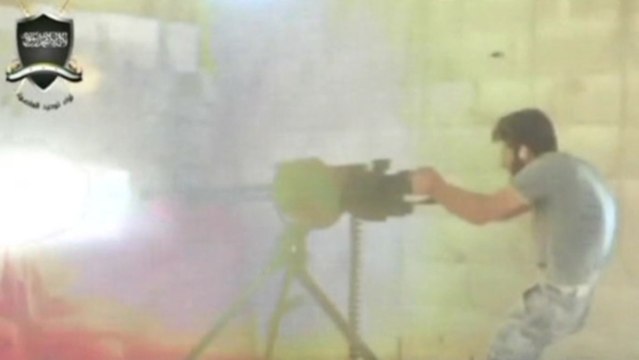 Video shows Syrian rebels clashing with pro-Assad forces in Damascus neighborhood