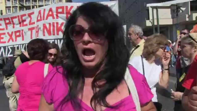 Greek civil servants strike over austerity cuts