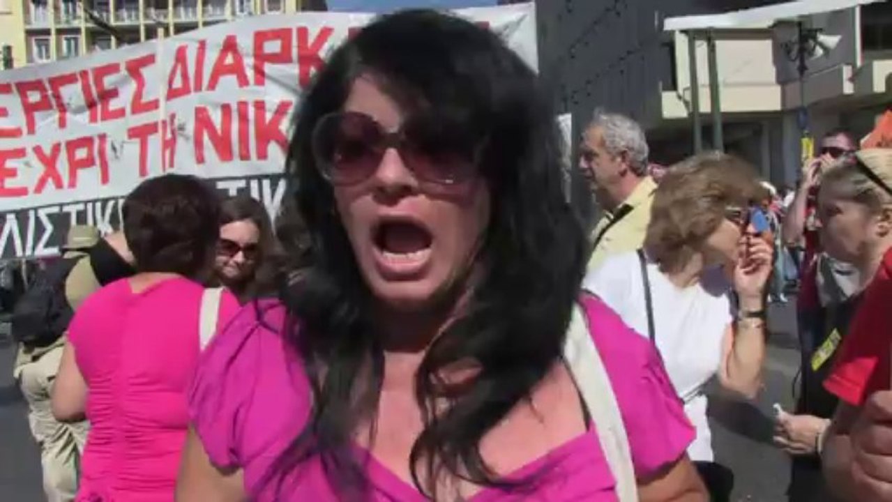 Greek civil servants strike over austerity cuts