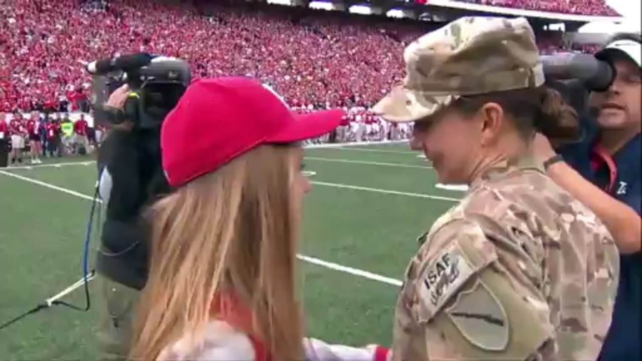 Army Captain surprises daughter at Wisconsin Football Game. Get the tissues!