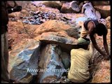 Miners planting explosives for mining the Aravallis