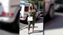 Kim Kardashian Sports a Green Jumpsuit For Lunch With Kourtney