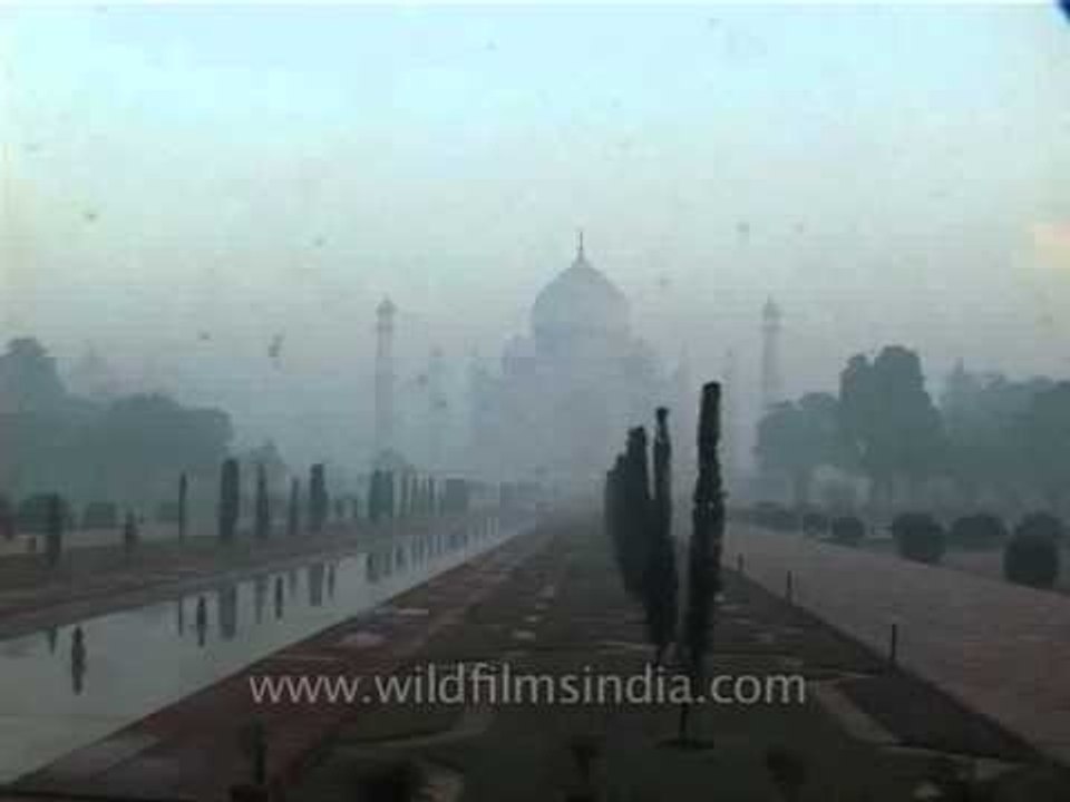 Taj Mahal partially covered with fog