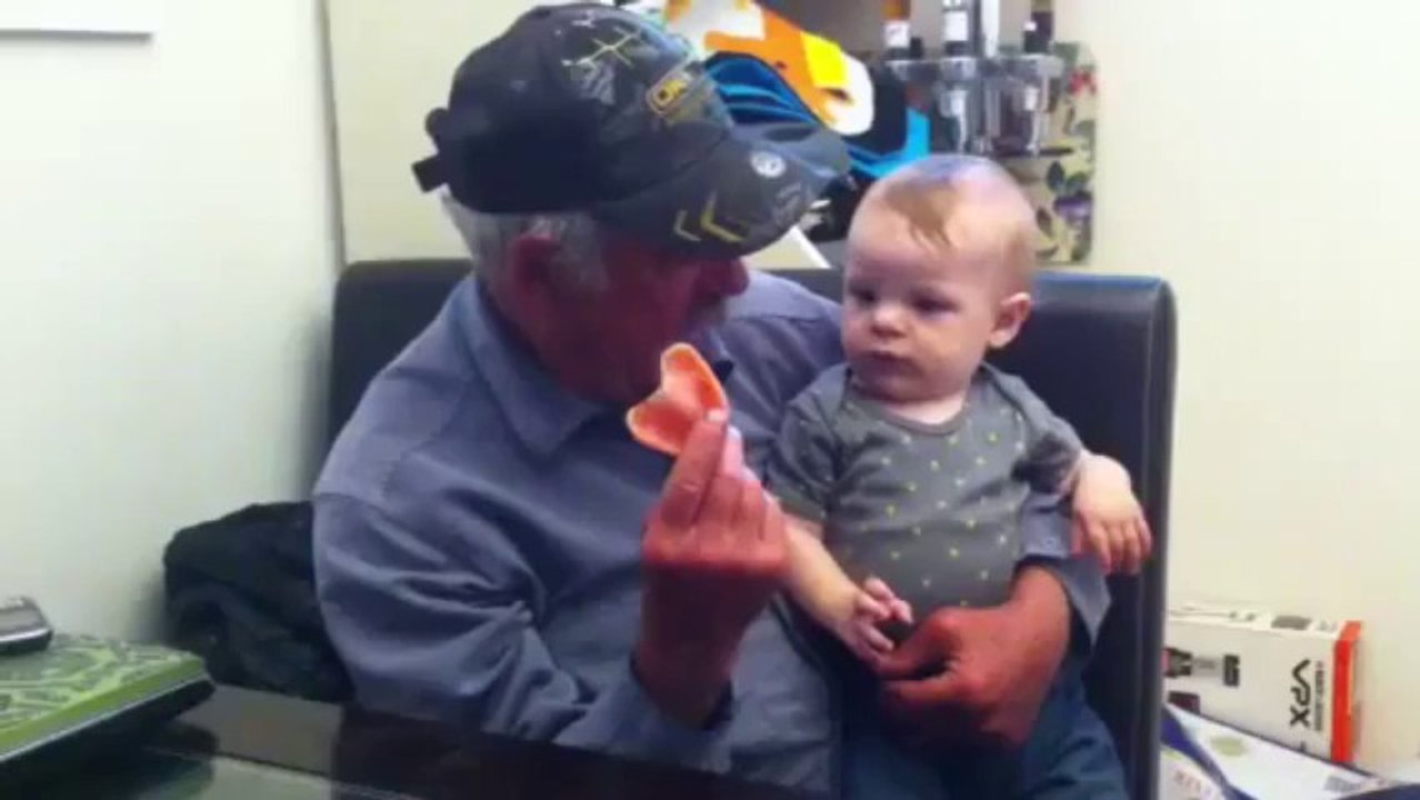 Grandpa removes teeth and scares baby