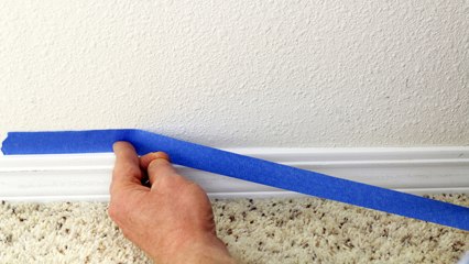 How to keep paint off of carpet when painting baseboard