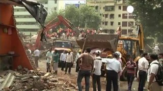 Dozens trapped in deadly building collapse in India