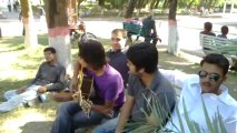 R M Dilawar playing guitar outside (SPIR) Quaid-I-Azam University,Islamabad