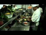 Chefs preparing meals for the customers: Days of the Raj restaurant