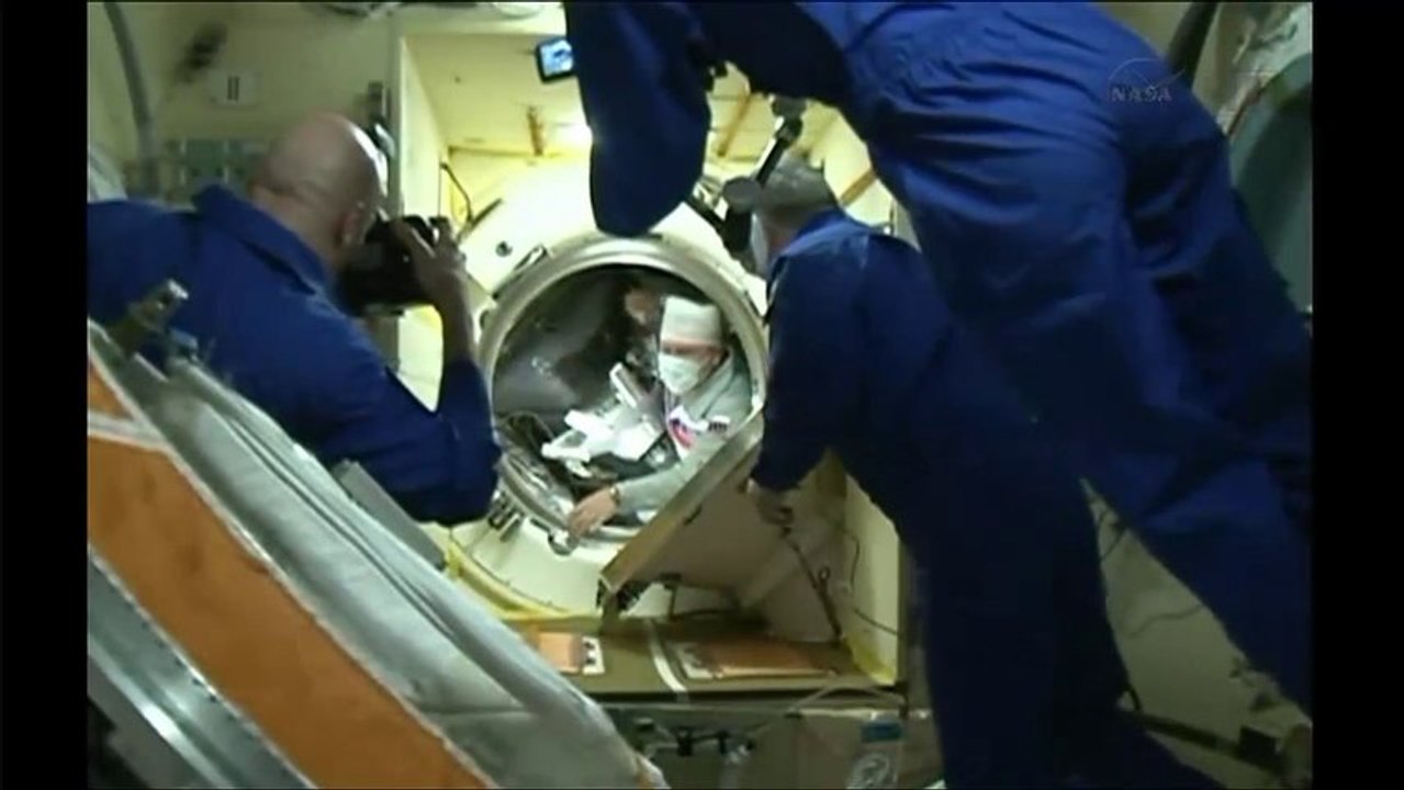 Expedition 37 Open Hatches to ISS & Greet Their Crew Members