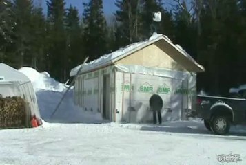 Guy Knocked Over by Snow Thrown From Roof