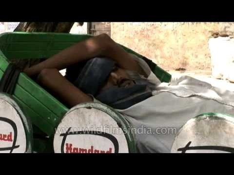 Rickshaw-puller in deep sleep!