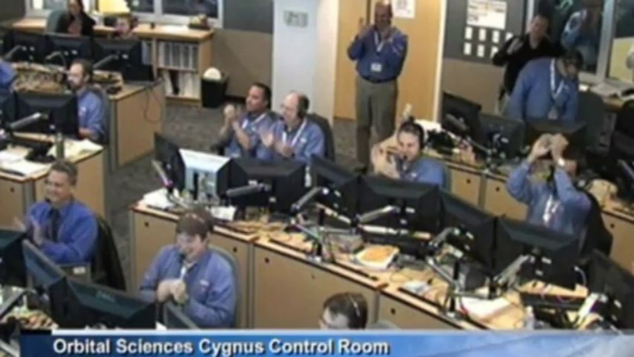 Astronauts grab cargo from space with robotic arm