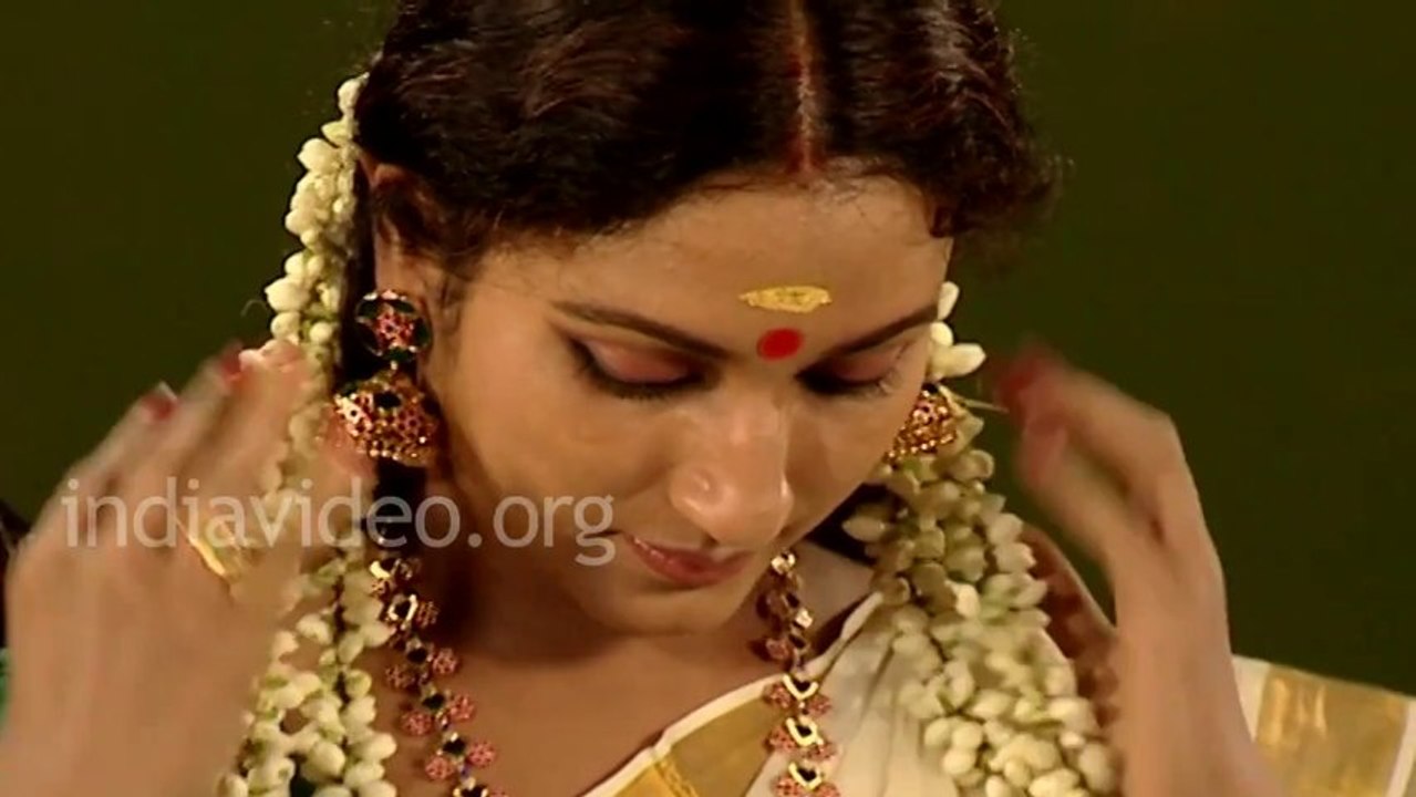 Hair adornment with jasmine garland Lifestyle Kerala