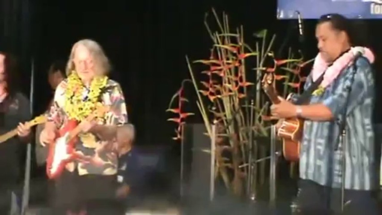 A euphoric man dancing at a concert