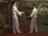 Ai hanmi yokomen tettsui uchi (uchi komi)