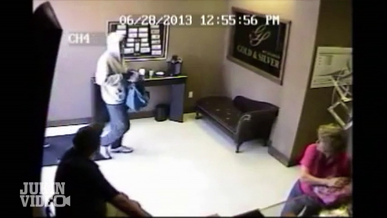 Store Owner Knocks out Robber With a Bat