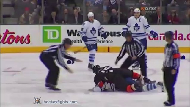 Hockey player Colton Orr knocked out by George Parros!! NHL 2011
