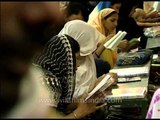 Devotees at the Dargah of the great Sufi saint, Nizamuddin Auliya