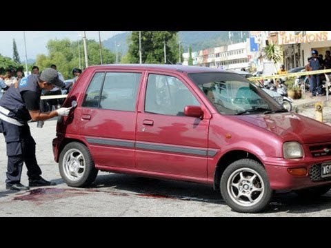 Malaysian murder: Former air force personnel shot thrice in head