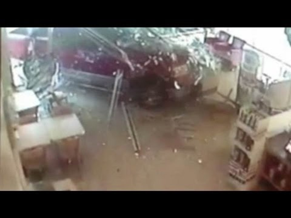 Old lady driving pickup truck crashes into Krispy Kreme