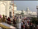 Devotees waiting patiently to enter the Golden temple in Amritsar