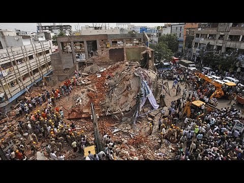 India hotel collapse leaves at least 12 dead, dozens missing