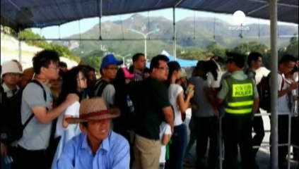 Mass evacuations in China as Typhoon Fitow nears