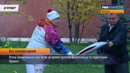 Russia re-lights the Olympic flame with a cigarette lighter